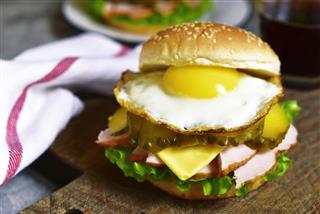 Cheeseburger With Ham And Fried Egg