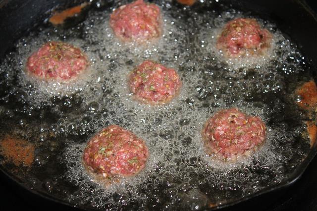Meatballs Frying In Oil
