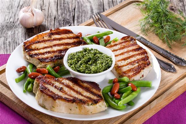 Grilled Pork Chops On A Dish