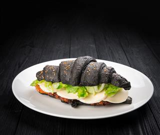Tasty Black Croissant With Stuffing