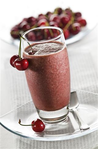 Cherry Smoothie In A Tall Glass