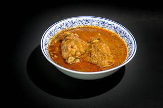 Thai Massaman Curry With Chicken In Bowl