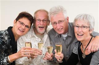 Elderly Couples With Champagne