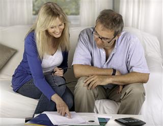 Couple Performing Financial Planning