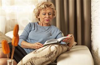 Senior Woman Reading Book