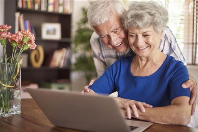 Senior Couple With Laptop