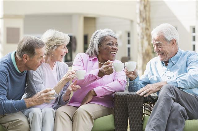 Multiracial Senior Friends Drinking Coffee