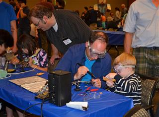 Child Learning Soldering