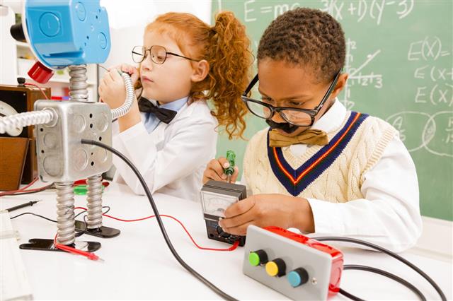 Children Making Robot In Science Lab