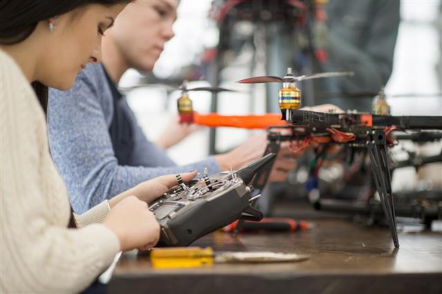 Students Fixing A Mechanical Drone