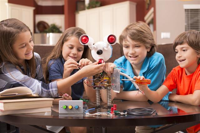 Children Build Robot Together At Home