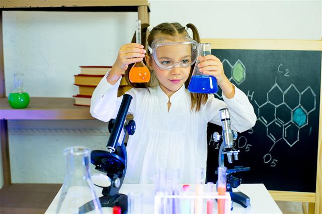 Young Girl Making Science Experiments