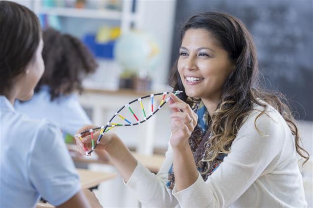 Educator Teaches Student About Dna