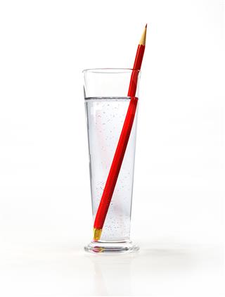 Pencil In Glass Of Water