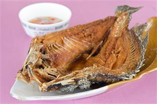 Fried Striped Bass Fish With Fish