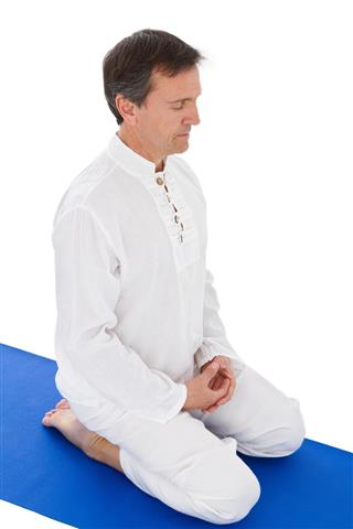 Adult man practicing yoga