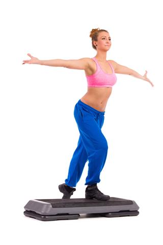 Woman Exercise Thighs On Aerobic Step