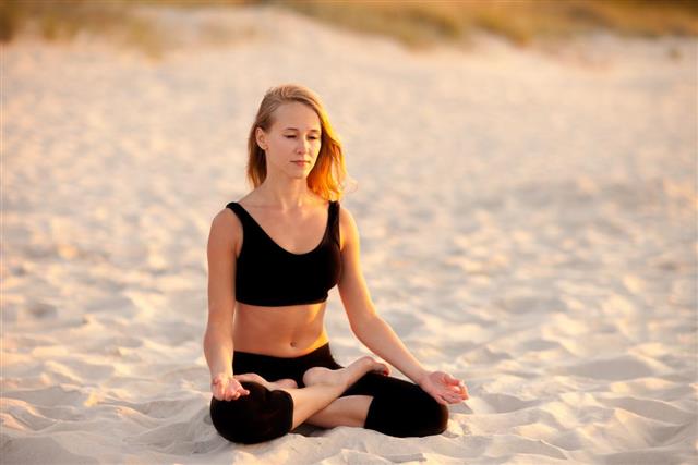 Meditation yoga on a beach