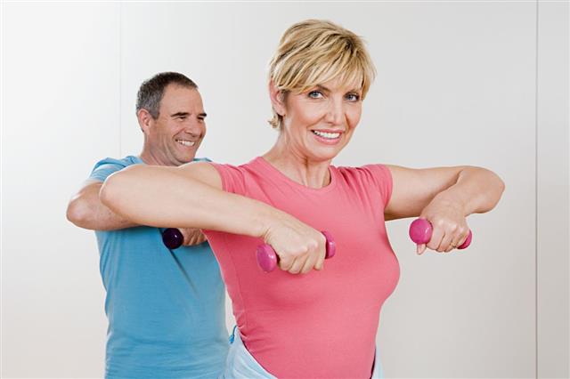 Couple with dumbbells