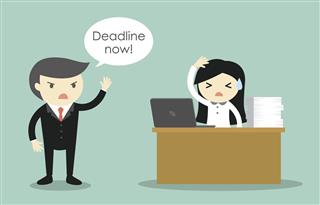 Business woman stressed about deadline