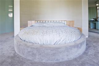 Round bed in modern bedroom