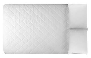 White mattress and two pillows