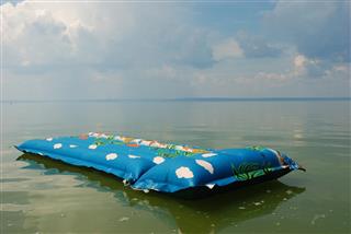 Inflatable mattress on waves