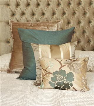 Gold and green silk cushions