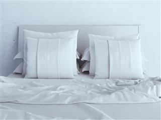 White pillows on a bed