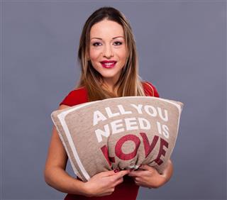 Valentines Day message with pillow all you need is love