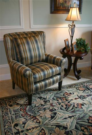Plaid Chair Flowered Carpet