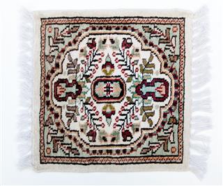 Light Colored Small Rug