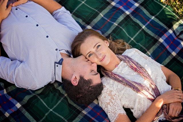 Young Couple On A Rug