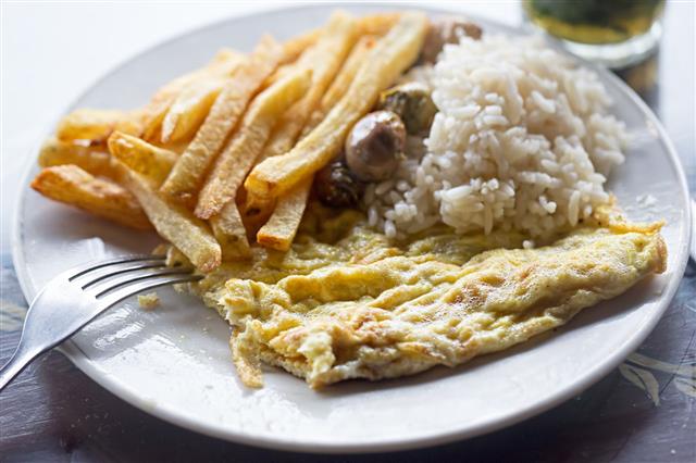 Omelette With Rice Fries And Olives