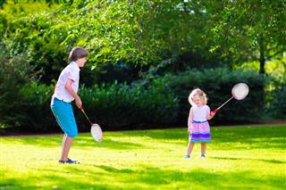 Kids Playing Badminton