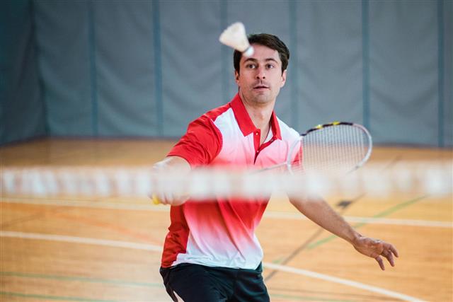 Man Playing Badminton