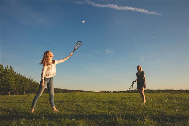 Friends Playing Badminton