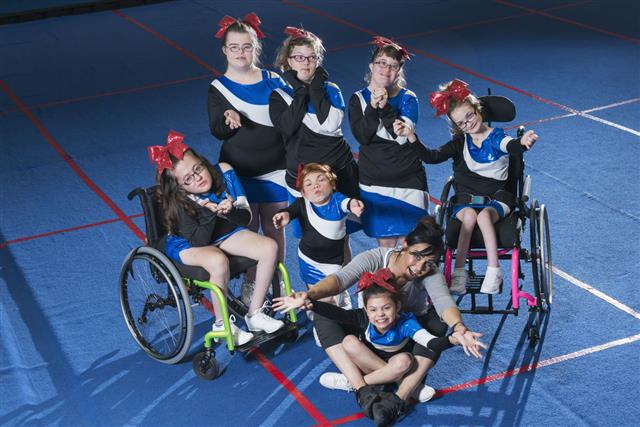 Special Needs Cheerleading Team With Coach