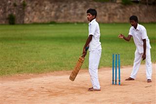 Young Sri Lankan Schoolboys Playing Cricket