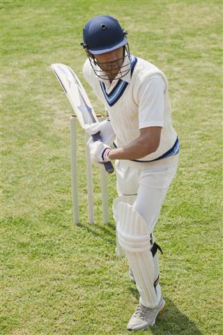 Cricket Batsman Playing A Defensive Stroke