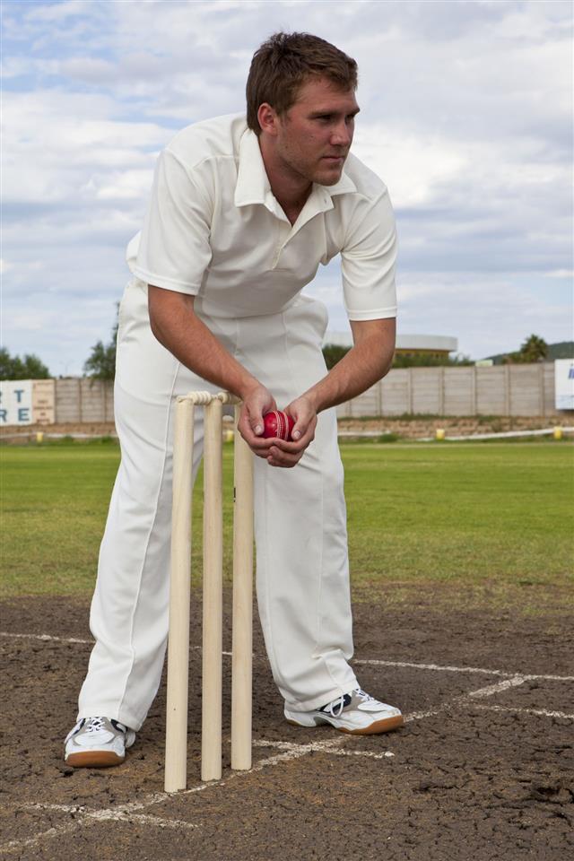 Cricket Player Behind Stumps