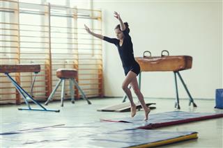 Girl Practicing Gymnastics