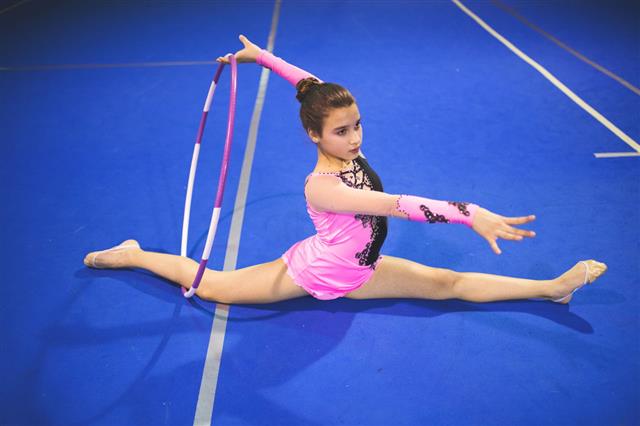 Girl Performing Rhythmic Gymnastics
