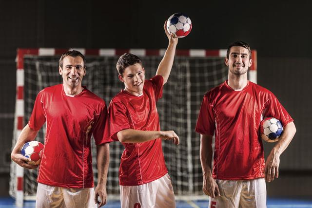 Three Handball Players