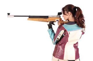 Woman Aiming A Pneumatic Air Rifle