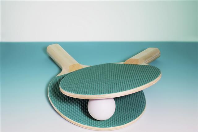 Tennis Paddles And Ball