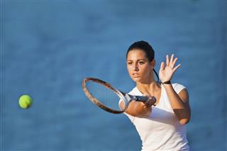 Young Woman At Forehand