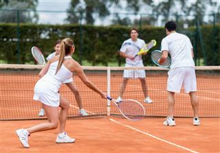 Friends Playing Tennis