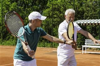 Tennis Class With Senior Man