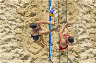Upper View Of Attractive Beach Volley Action On The Net